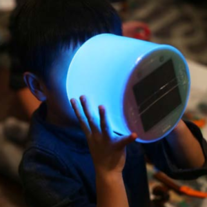 boy holding luci color (blue) solar inflatable light